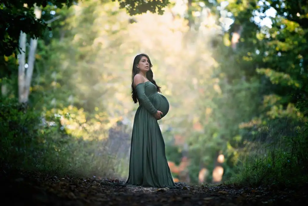 Pregnant woman in a green dress