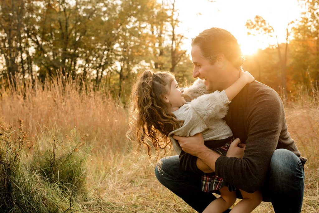father and daughter outdoor photograph