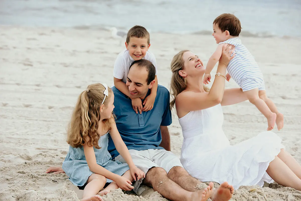 A Family Enjoying their Time on the Beach