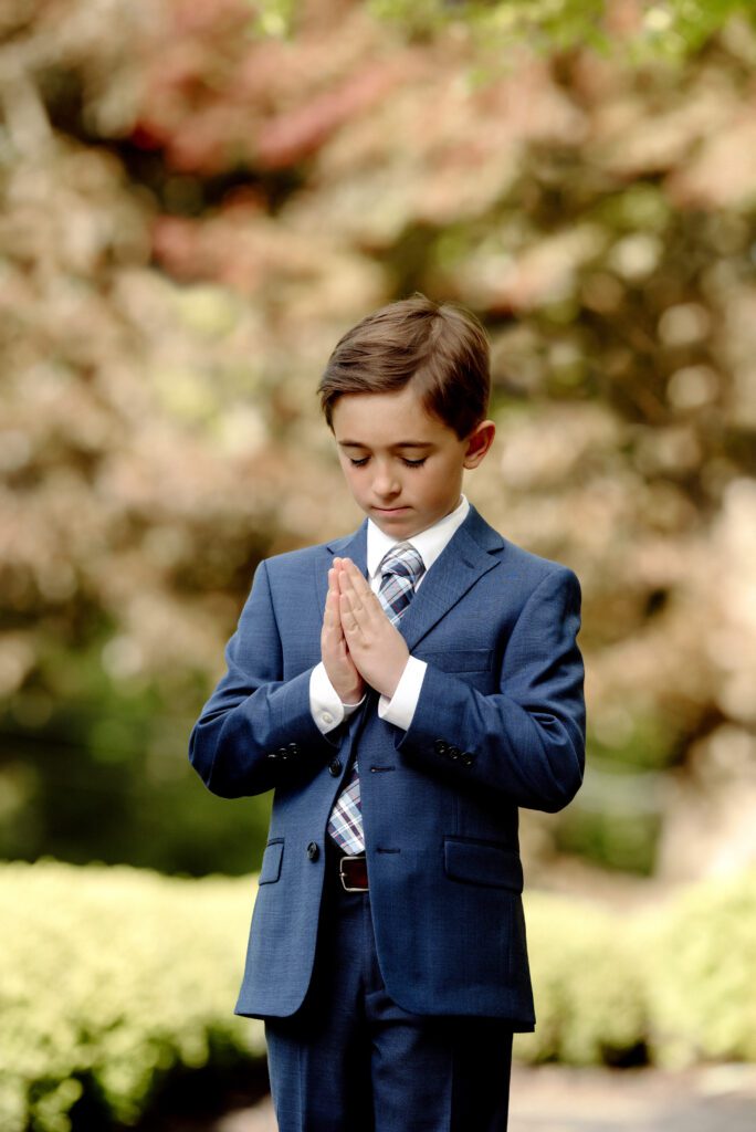First Communion portrait in New Jersey of boy wearing suit
