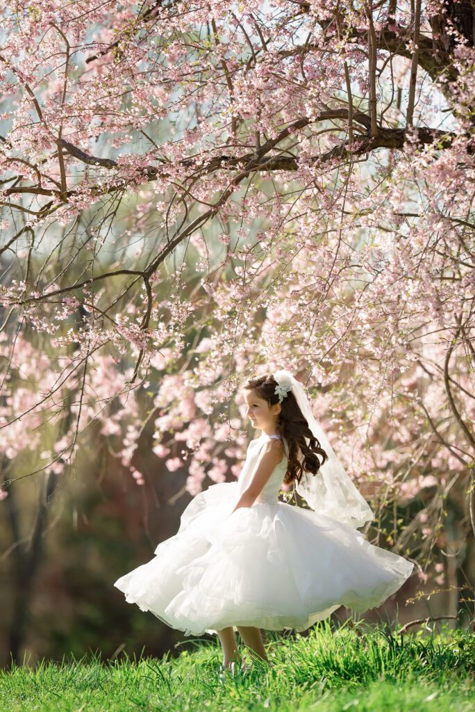 First Communion in Cherry Blossom Tree at Garden Park in New Jersey